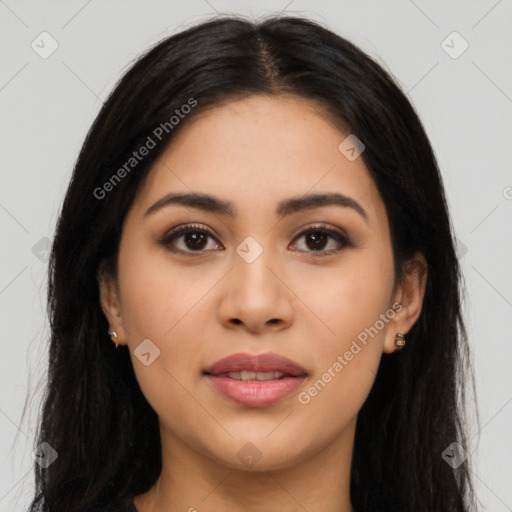 Joyful latino young-adult female with long  brown hair and brown eyes