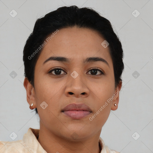 Joyful latino young-adult female with short  brown hair and brown eyes