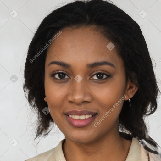 Joyful black young-adult female with medium  black hair and brown eyes