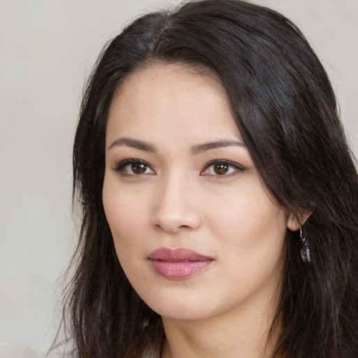 Neutral white young-adult female with long  black hair and brown eyes