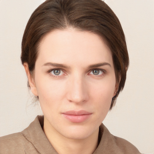 Neutral white young-adult female with short  brown hair and brown eyes