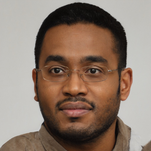 Neutral black young-adult male with short  black hair and brown eyes