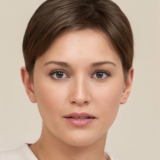 Neutral white young-adult female with short  brown hair and brown eyes