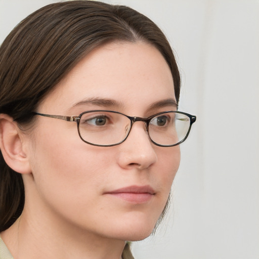 Neutral white young-adult female with medium  brown hair and grey eyes