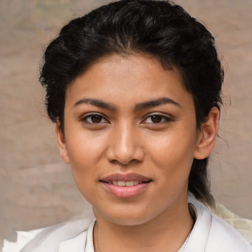 Joyful asian young-adult female with short  brown hair and brown eyes