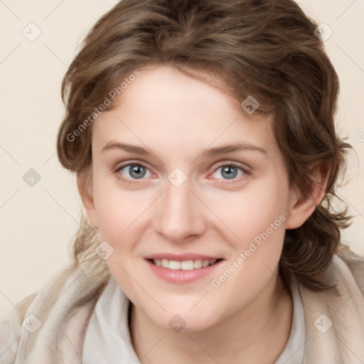 Joyful white young-adult female with medium  brown hair and blue eyes