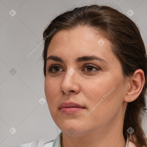 Neutral white young-adult female with medium  brown hair and brown eyes