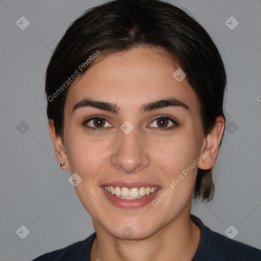 Joyful white young-adult female with medium  brown hair and brown eyes