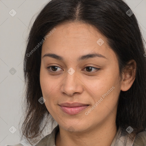 Joyful latino young-adult female with medium  brown hair and brown eyes