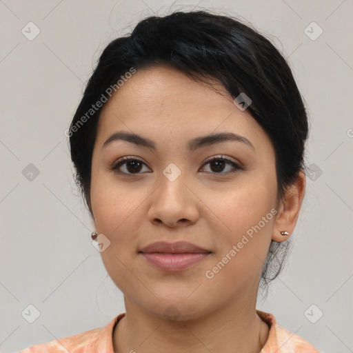 Joyful latino young-adult female with medium  black hair and brown eyes