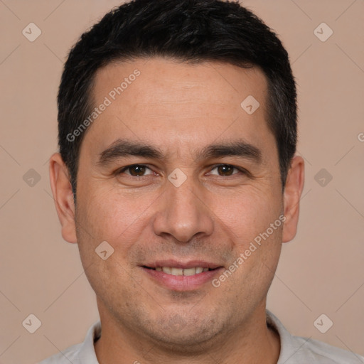 Joyful white adult male with short  brown hair and brown eyes