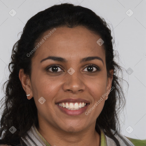 Joyful black young-adult female with long  brown hair and brown eyes