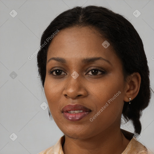 Joyful black young-adult female with medium  black hair and brown eyes