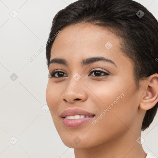 Joyful latino young-adult female with short  brown hair and brown eyes