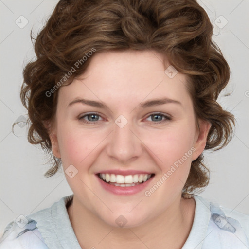 Joyful white young-adult female with medium  brown hair and blue eyes