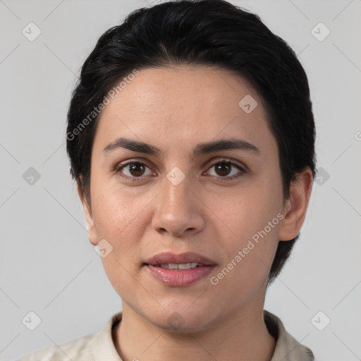 Joyful white young-adult female with short  black hair and brown eyes