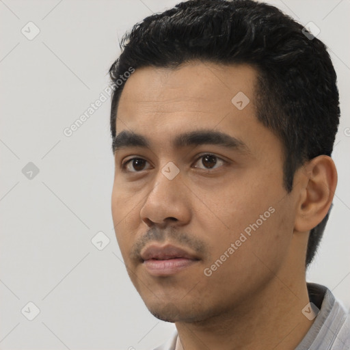 Neutral asian young-adult male with short  black hair and brown eyes