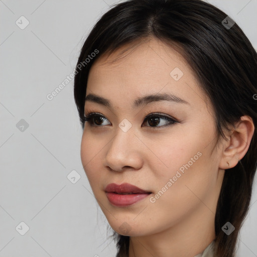 Joyful white young-adult female with medium  brown hair and brown eyes