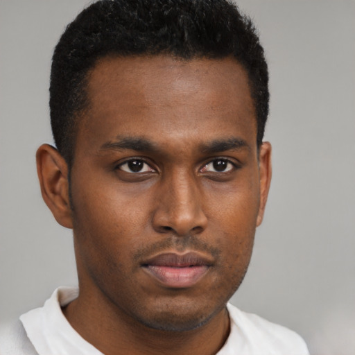 Neutral black young-adult male with short  brown hair and brown eyes