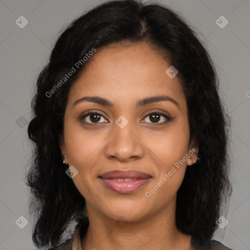 Joyful latino young-adult female with long  brown hair and brown eyes