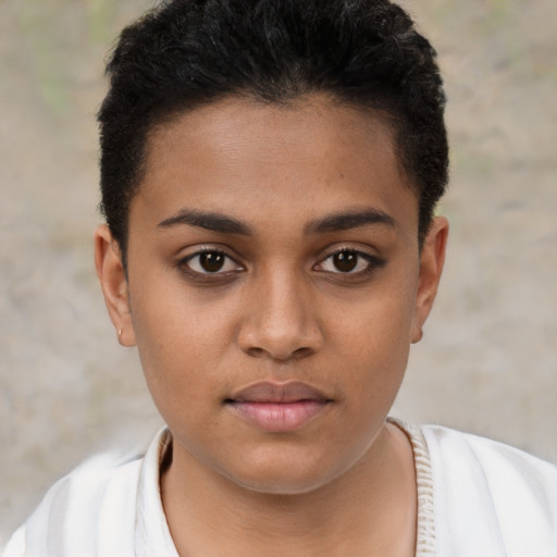 Joyful latino young-adult female with short  brown hair and brown eyes