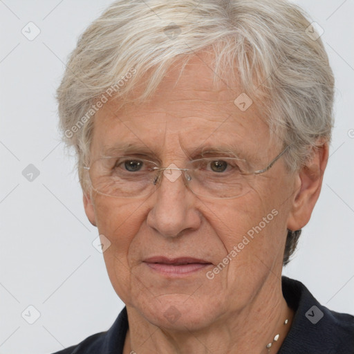 Joyful white middle-aged male with short  gray hair and brown eyes