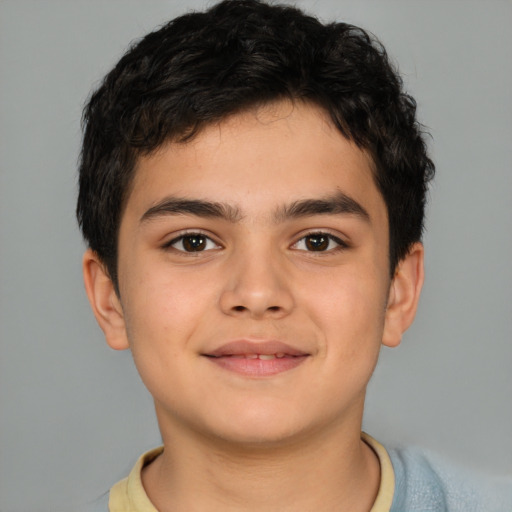 Joyful asian child male with short  brown hair and brown eyes