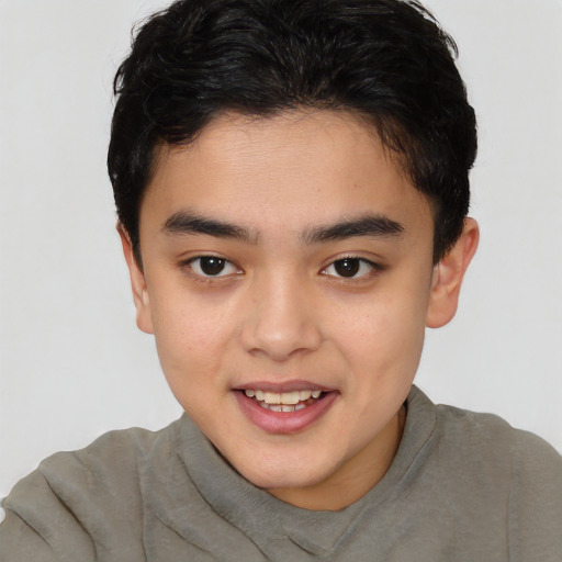 Joyful white child male with short  brown hair and brown eyes