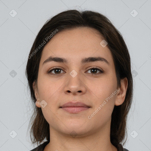 Joyful white young-adult female with medium  brown hair and brown eyes