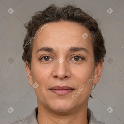 Joyful white adult female with short  brown hair and brown eyes