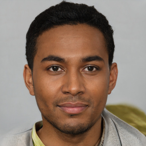 Neutral black young-adult male with short  black hair and brown eyes