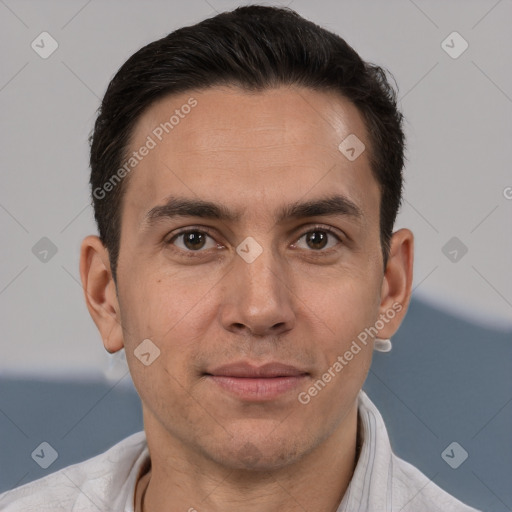 Joyful white adult male with short  brown hair and brown eyes