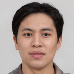 Neutral asian young-adult male with short  black hair and brown eyes