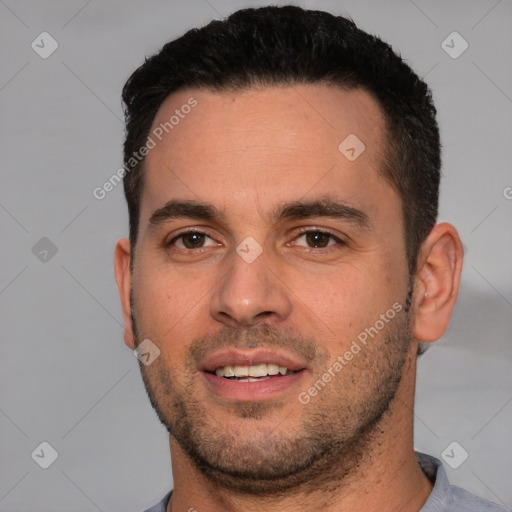 Joyful white young-adult male with short  black hair and brown eyes