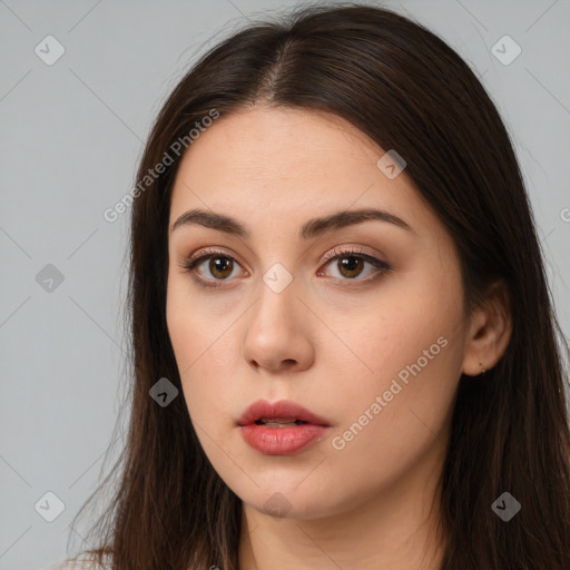 Neutral white young-adult female with long  brown hair and brown eyes