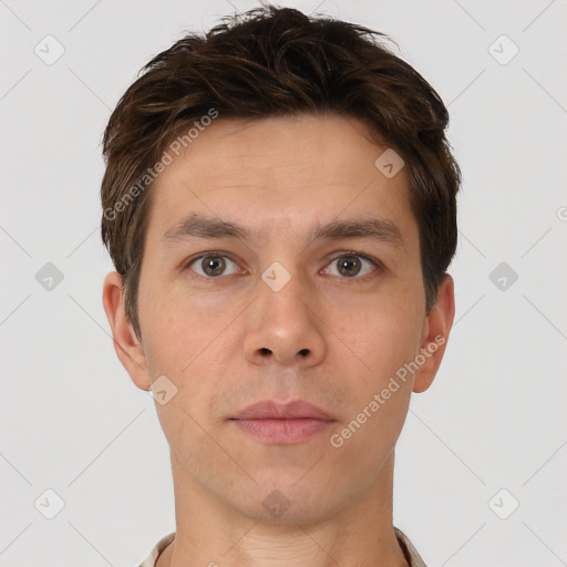 Neutral white young-adult male with short  brown hair and brown eyes