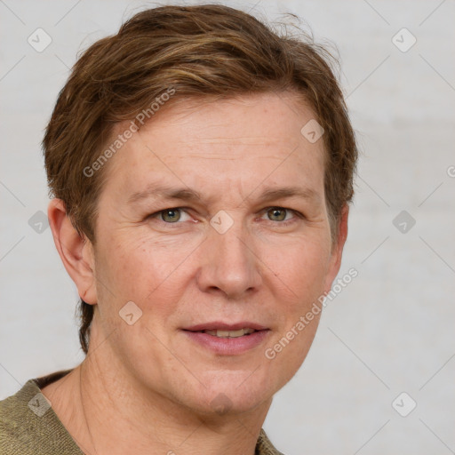 Joyful white adult female with short  brown hair and grey eyes