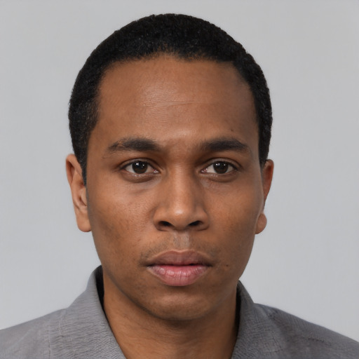 Neutral black young-adult male with short  black hair and brown eyes