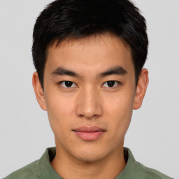 Neutral asian young-adult male with short  brown hair and brown eyes