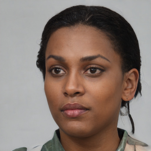 Neutral latino young-adult female with medium  black hair and brown eyes