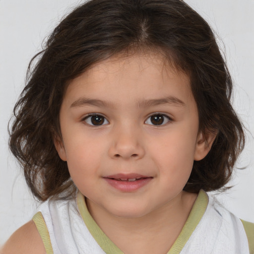 Joyful white child female with medium  brown hair and brown eyes