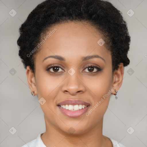 Joyful black young-adult female with short  brown hair and brown eyes