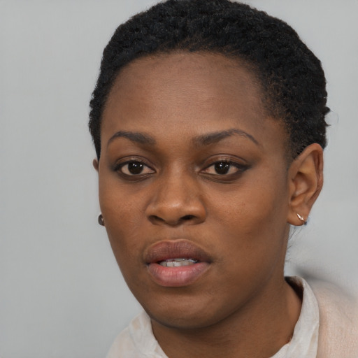Neutral black young-adult female with short  black hair and brown eyes