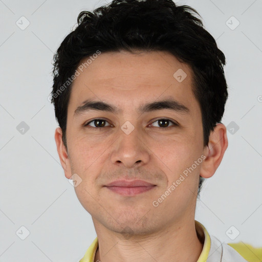 Joyful latino young-adult male with short  brown hair and brown eyes