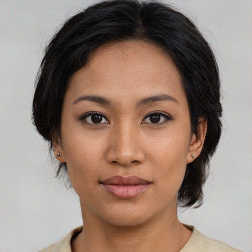 Neutral asian young-adult female with medium  black hair and brown eyes