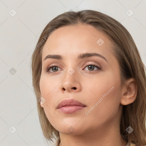 Neutral white young-adult female with long  brown hair and grey eyes