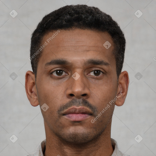 Neutral latino young-adult male with short  brown hair and brown eyes