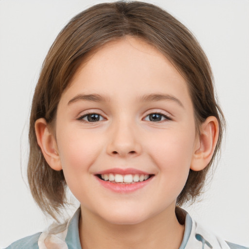 Joyful white child female with medium  brown hair and grey eyes