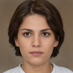 Neutral white young-adult female with medium  brown hair and brown eyes