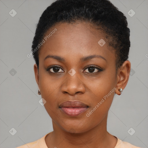 Joyful black young-adult female with short  brown hair and brown eyes